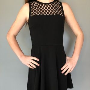 black dress with fishnet top